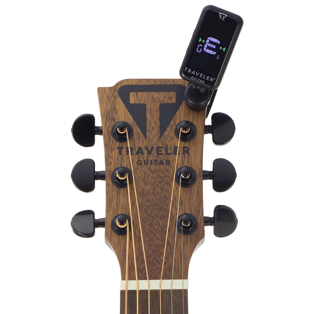 Traveler Guitar Clip-On Tuner clipped on Acoustic guitar headstock